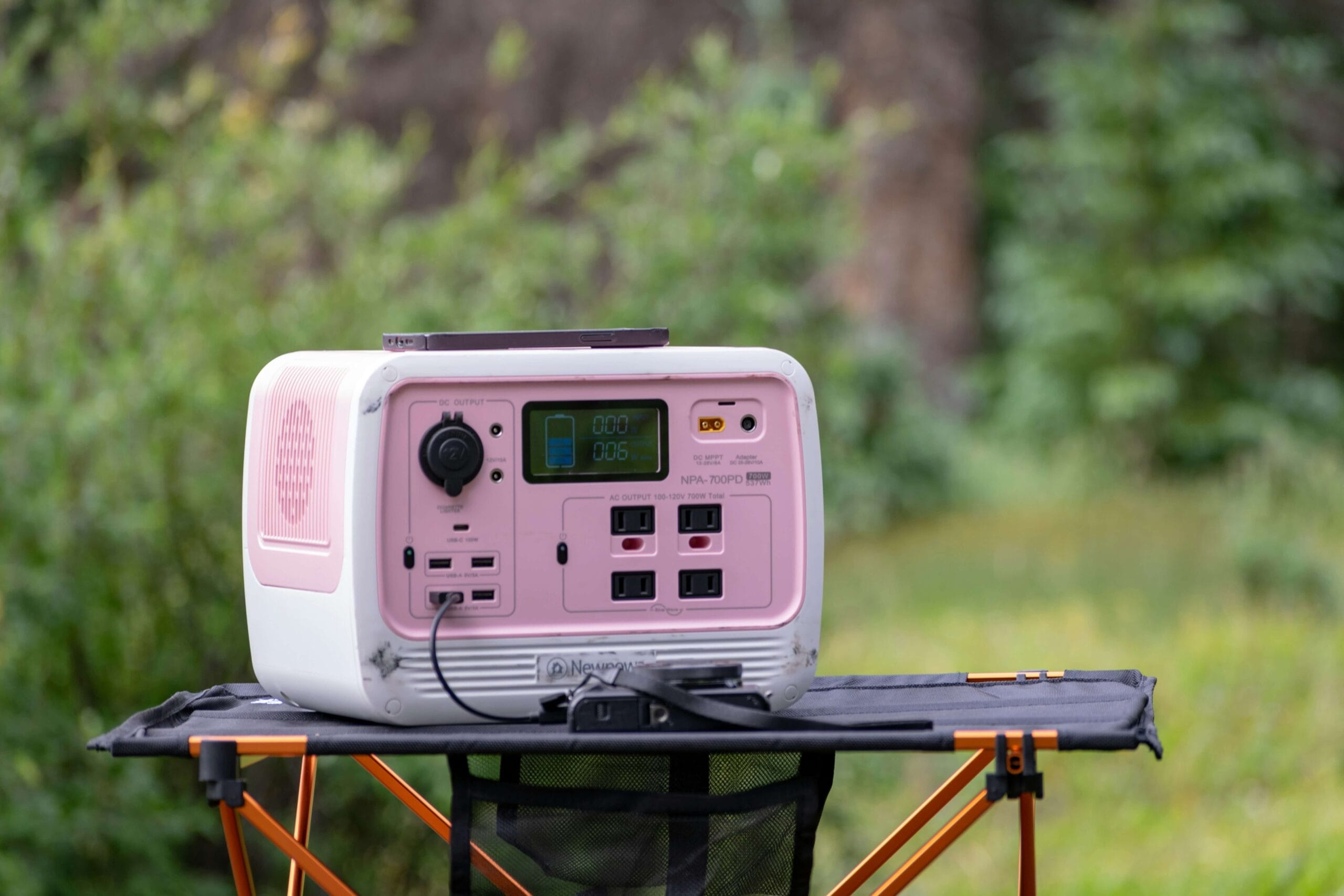 Quiet portable generator running at a campsite