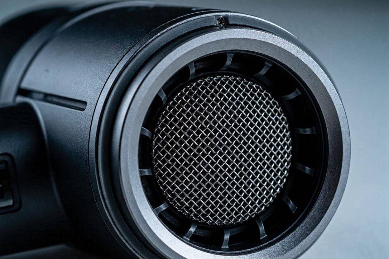 A macro close-up of the acoustic air filter on a quiet brushless hair dryer